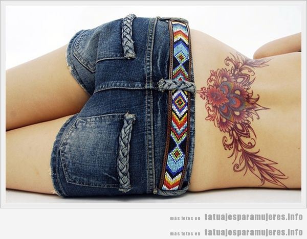 Tatuaje tribal para chica en la zona lumbar